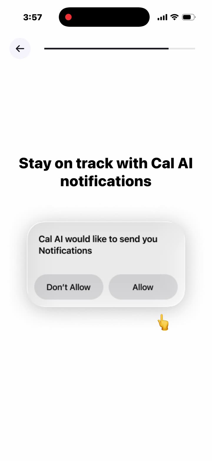 “Stay on track with Cal AI notifications”: a fake permission dialog with a pointing hand on Allow. The real iOS prompt follows.